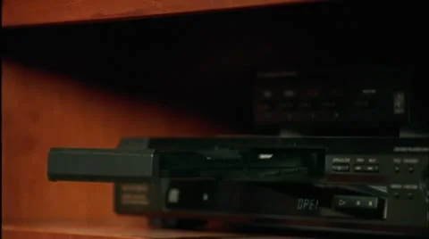 MISC. DVD INTO PLAYER 01 Stock Footage 10802500