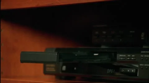 MISC. DVD INTO PLAYER 04 Stock Footage 10802520