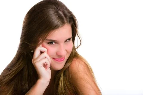 Mischievous or evil Hispanic young woman expression. Stock Photos