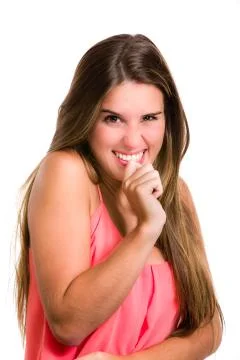 Mischievous or evil Hispanic young woman expression. Stock-Fotos