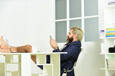 Misconceptions about what telecommuting is really like. Work through evening or Stock Photos