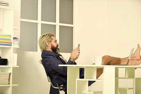 Misconceptions about what telecommuting is really like. Work through evening or Stock Photos