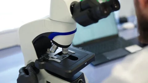 Miscroscope research work at the science center Stock Footage 276541153