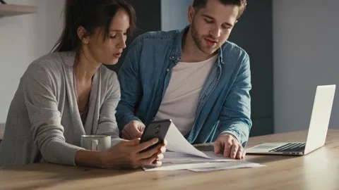 Miserable young caucasian couple having financial problems due to new house Video stock 169148438