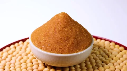 Miso and soybeans on a tray, rotating. Stock Footage 304770899