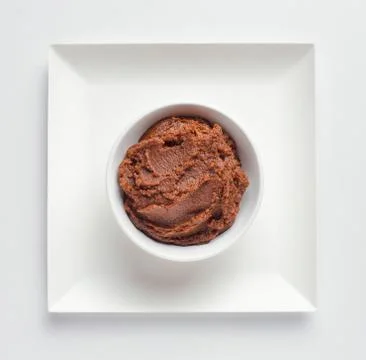 Miso paste in a white bowl Stock Photos