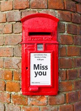 Miss you message on a post box Stock Photos