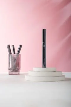 Missha 3D eye lashes mascara tube on white concrete decor Stock Photos