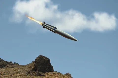 Missile attack occurs in the sky above mountains in Middle East region 스톡 사진