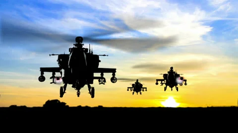 Missile attack at sunset horizon by apache ah-64 gunship helicopters Stock Footage 37867924
