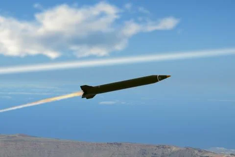 Missile in flight over mountain landscape with fiery trail in sky Stock Photos