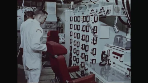 Missile launch crews work at launch control room - 1967 Stock Footage 103592149