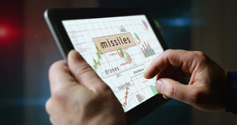 Missiles drones charts graphs on touchscreen pad display Stock Footage 335710946