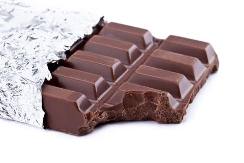 Missing bite of chocolate bar Stock Photos