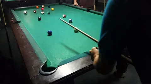 Missing blue ball number 2 with a trick shot from billiard pocket in eight ball Stock Footage 58952554