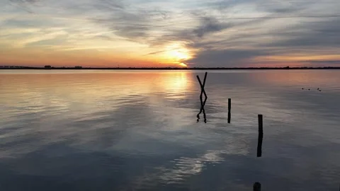 Missing Dock Calm Waters at Sunset 스톡 동영상 260733918