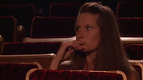 The missing girl in the empty auditorium Video stock 70429061