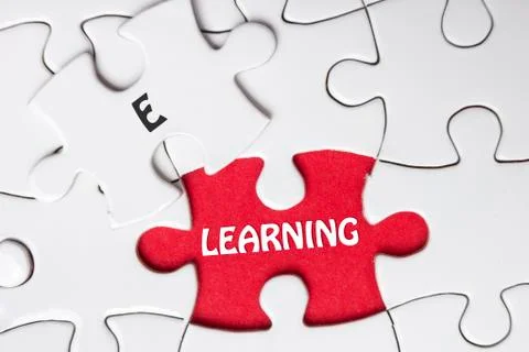 Missing jigsaw puzzle with E learning word Stock Photos