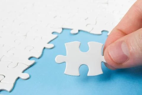 Missing jigsaw puzzle pieces. Business concept. Compliting final task Stock Photos