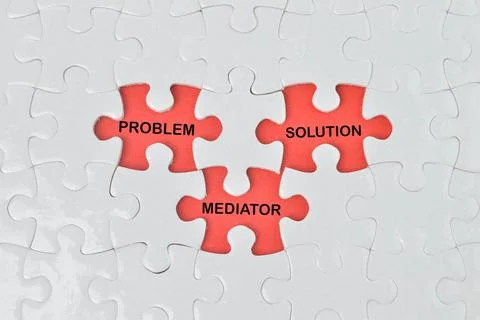Missing jigsaw puzzle with the word PROBLEM, SOLUTION and MEDIATOR. Stock Photos