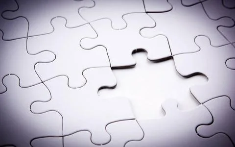 Missing Link Jigsaw puzzle with a key piece missing to link it together Co... Stock Photos