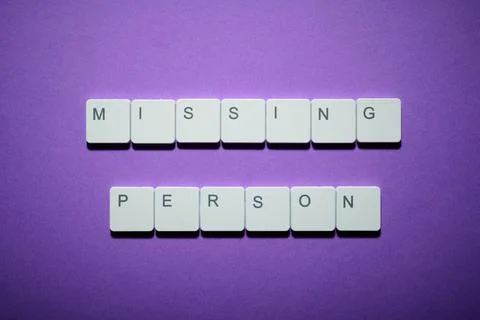 Missing person text written witk white keys of a keyboard Stock Photos