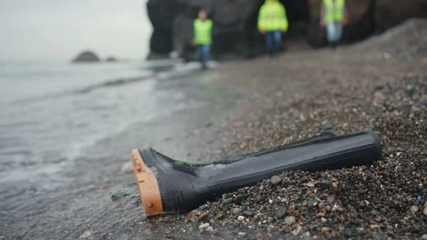 Missing person's shoes evidence close-up on the beach waves coastline Stock-Footage 235790178
