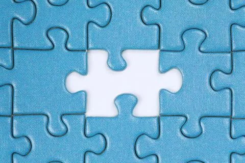 The missing piece in a puzzle Stock Photos