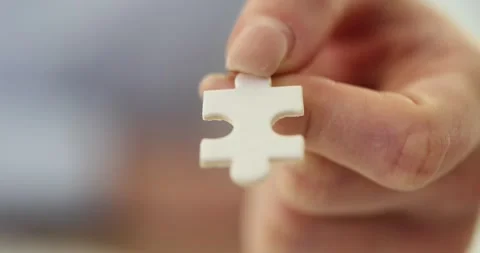 Missing piece was found in white puzzle Stock Footage 256324030