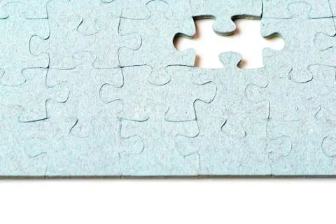 Missing puzzle piece and light blue puzzle pieces Stock Photos