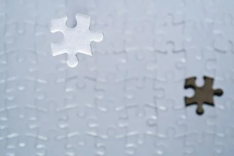Missing Puzzle Piece Hovering Over Gap for Business Solution Concept 写真素材