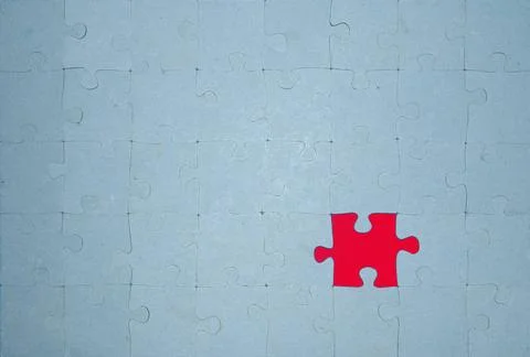 Missing puzzle piece the missing red part of the puzzle Copyright: xZoonar... Stock Photos