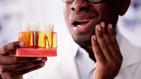 The Missing Tooth: A Portrait of Dental Decay in America - A young man struggles Stock Footage 277908212