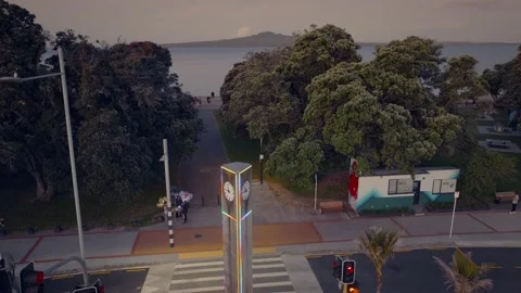 Mission Bay clock tower and view out to Rangitoto, Auckland, New Zealand Stock-Footage 228310623
