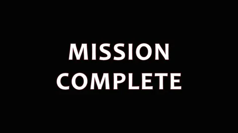 Mission Complete text appearing on black background with cinematic motion f.. Stock Footage 344036809