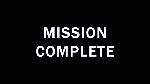 Mission Complete text appearing sequentially on black background with subtl.. Stock Footage 344037123
