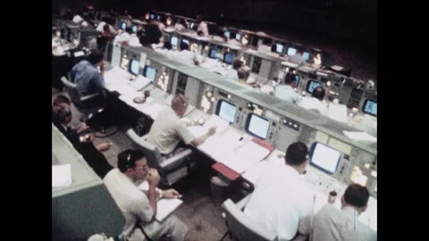 Mission Control staff working at computers during Apollo 11 launch Stock Footage 274336023