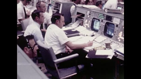 Mission Control staff working at stations during Apollo 11 spacecraft launch Stock Footage 274335945