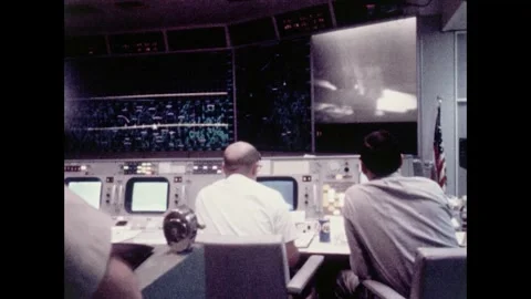 Mission Control staff working at stations during Apollo 11 spacecraft launch Stock Footage 274335946