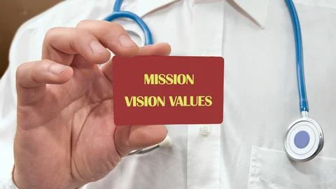 Mission vision values symbol. Concept words Mission Vision Values on a red bu Stock Photos