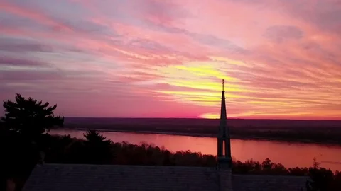 Mississippi River sunrise church steeple Aerial Stock Footage