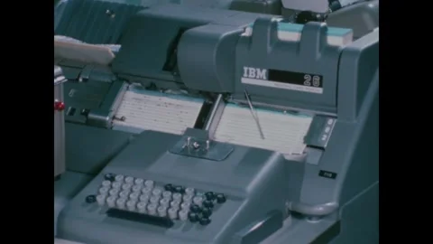 MISSOURI - 1966 - Close-up of documents being processed through a key punch Stock Footage 340669656