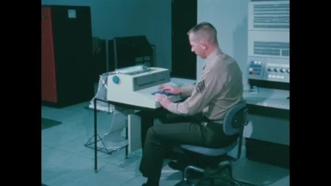 MISSOURI - 1966 - A US Marine types into a printer. 库存影片 340669703