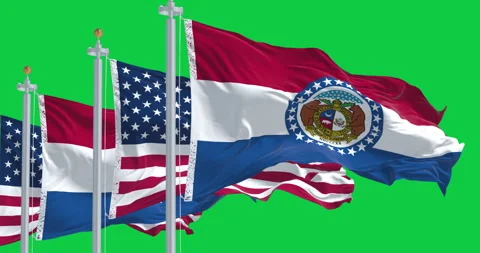 Missouri and the US flags waving in the wind isolated on green background Stock Footage 344960382
