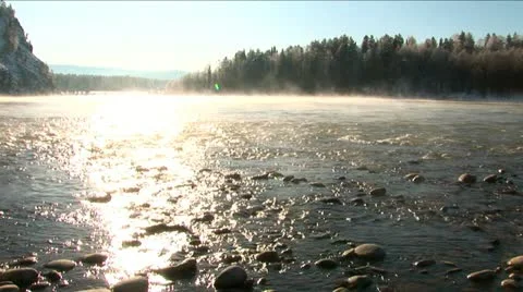 Mist above the snowy river in winter morning. Stock Footage 10814099