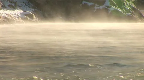 Mist above the snowy river in winter morning. Stock Footage 10814115