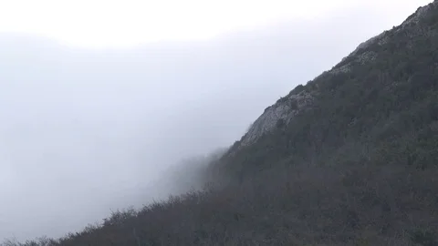 Mist and clous through mountains of France Stock Footage 71722402