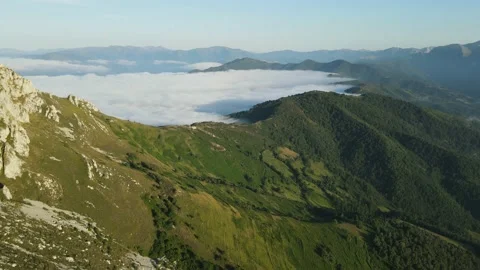MIST BENCHES UNDER MOUNTAIN Stock Footage 165991325