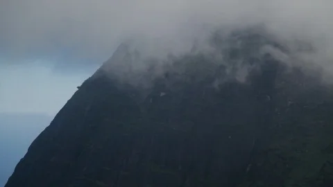 Mist blows in front of a mountaintop Rio Stock Footage 91057791