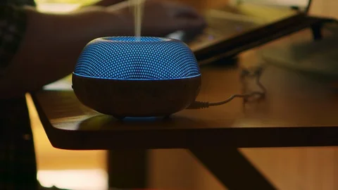Mist from blue led electric essential oil diffuser Video stock 128810321